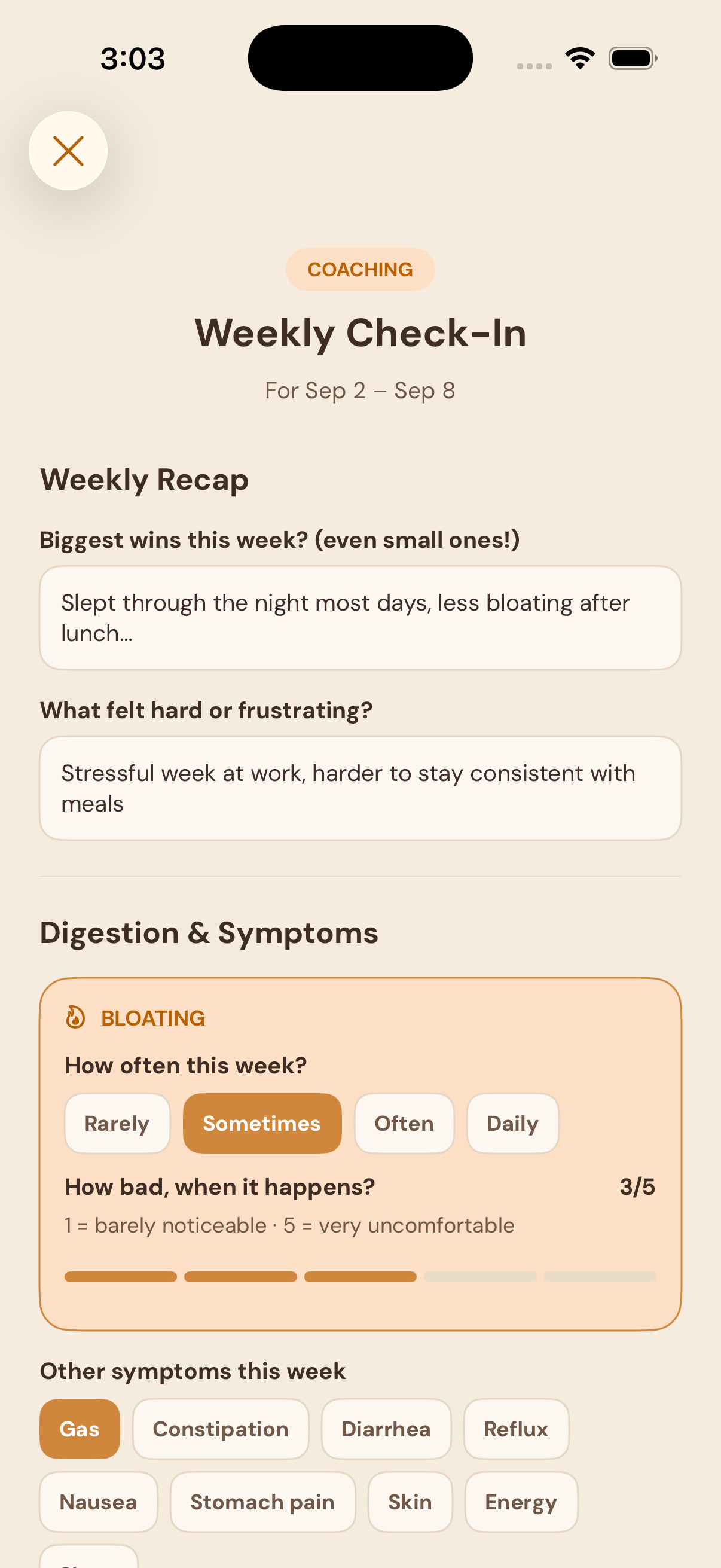 iPhone app showing a coaching check-in about wins and symptoms